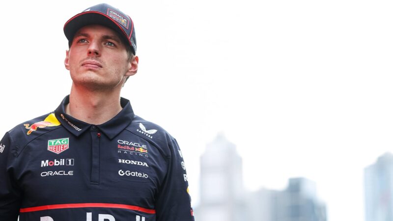 Max Verstappen in front of Melbourne skyline ahead of 2025 F1 Australian Grand Prix