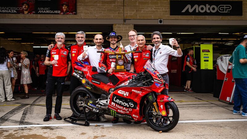 Pecco Bagnaia celebrates 2025 MotoGP US GP win with Ducati team